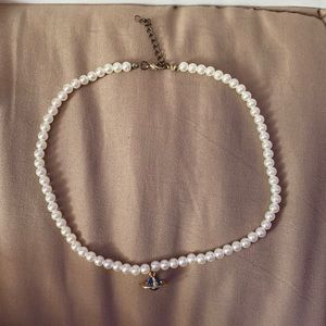 space ship pearl necklace
